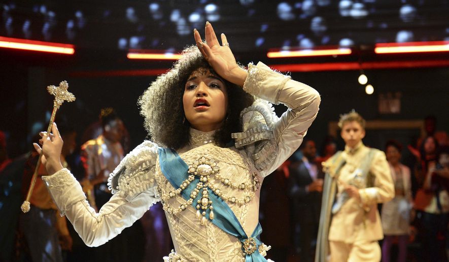 This image released by FX shows Indya Moore as Angel in a scene from the new series "Pose," airing Sundays on FX. (JoJo Whilden/FX via AP)