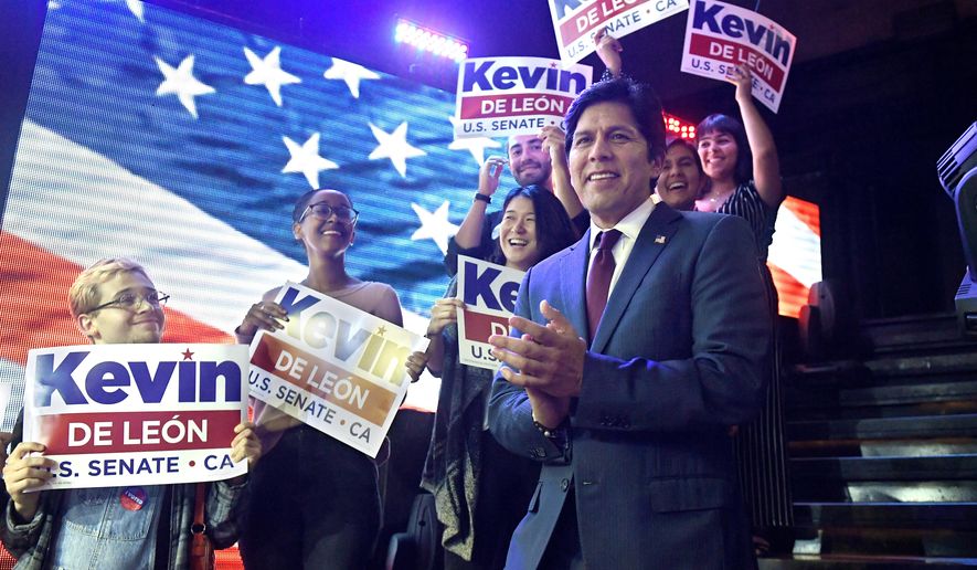 Kevin de Leon, California state Senate president pro tem and Democratic candidate for the U.S. Senate, takes the stage before speaking during an election party Tuesday, June 5, 2018, in Los Angeles. (AP Photo/Mark J. Terrill)