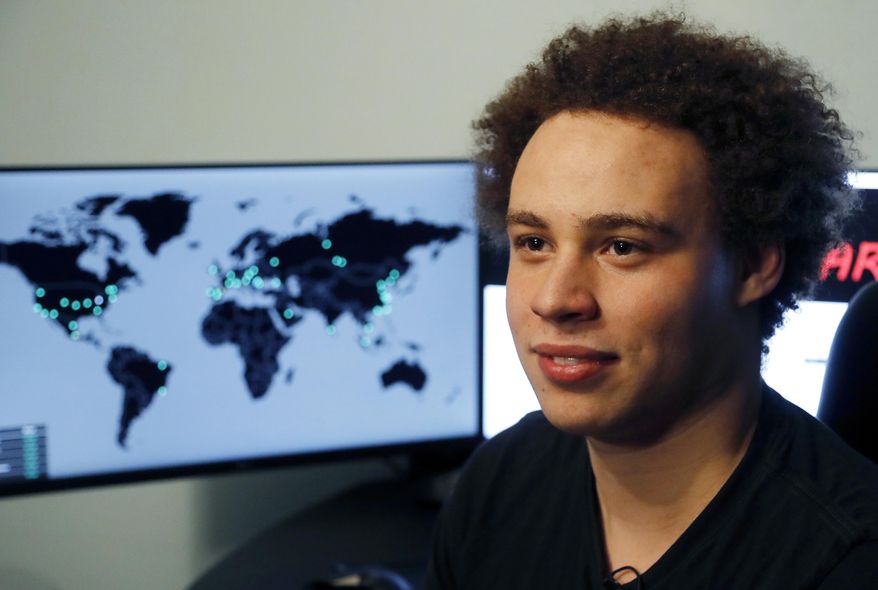 FILE - In this May 15, 2017, file photo, British cybersecurity researcher Marcus Hutchins, branded a hero for slowing down the WannaCry global cyberattack, pauses during an interview in Ilfracombe, England. Hutchins is facing a new charge of lying to the FBI in an indictment accusing him of developing malware to steal banking information. The allegation is among four new charges federal prosecutors filed Wednesday, June 6, 2018, against Hutchins. It means he now faces 10 charges of computer fraud and trying to access computers without authorization. (AP Photo/Frank Augstein, File)