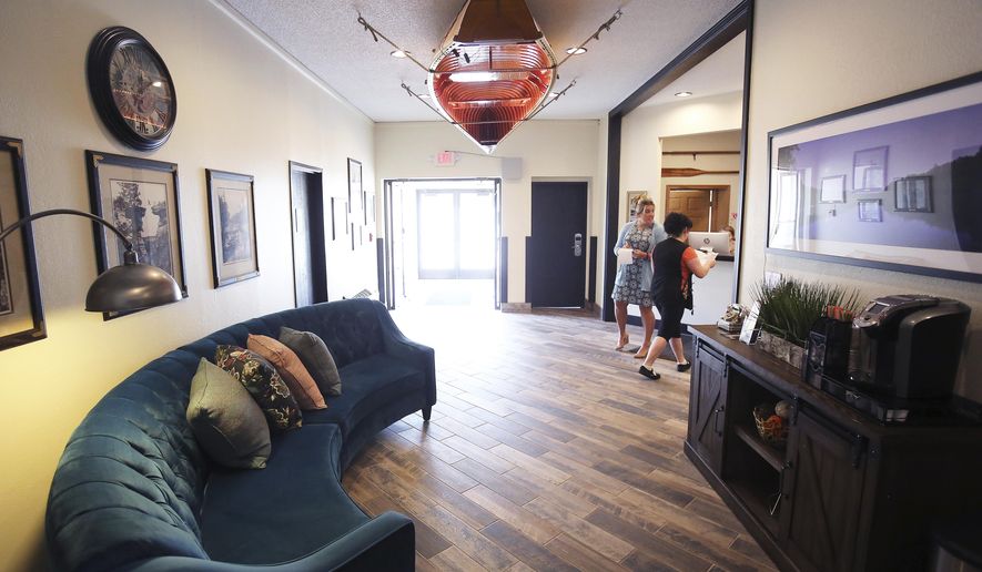 A $750,000 renovation has transformed the River Inn Resort in Wisconsin Dells into a boutique hotel. The property, pictured Thursday, May 24, 2018, is just a few blocks north of the city's historic downtown and offers picturesque views of the Wisconsin River. (John Hart/Wisconsin State Journal via AP)