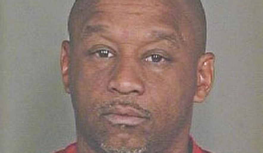 This undated booking photo provided by the Scottsdale Police Department shows Dwight Lamon Jones, who police say is responsible for killing six people in metro Phoenix over a three-day period. Jones, 56, shot himself to death as police were closing in on him Monday, June 4, 2018, at a Scottsdale, Ariz., hotel. Three of the victims were connected to Jones' divorce. He was arrested in 2009 for domestic abuse. (Scottsdale Police Department via AP)
