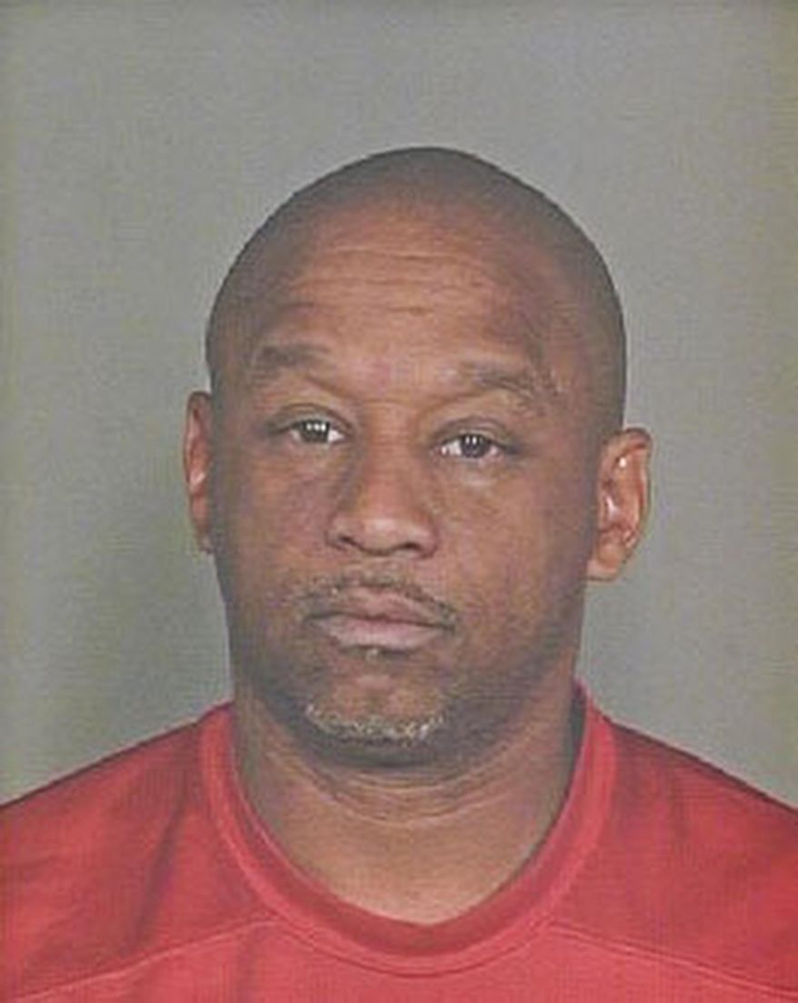 This undated booking photo provided by the Scottsdale Police Department shows Dwight Lamon Jones, who police say is responsible for killing six people in metro Phoenix over a three-day period. Jones, 56, shot himself to death as police were closing in on him Monday, June 4, 2018, at a Scottsdale, Ariz., hotel. Three of the victims were connected to Jones' divorce. He was arrested in 2009 for domestic abuse. (Scottsdale Police Department via AP)