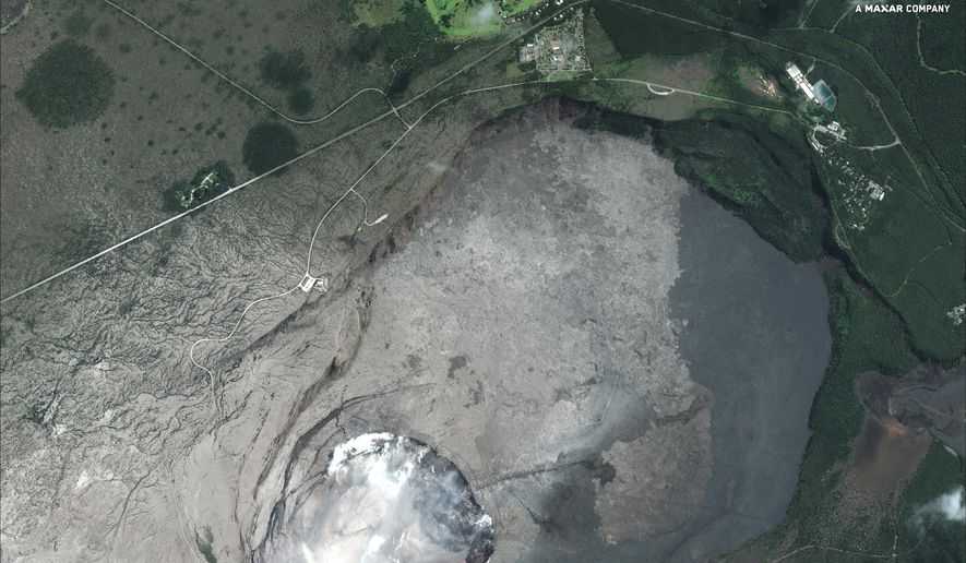 This satellite image provided by Digital Globe captured June 5, 2018, shows Kilauea summit crater in Hawaii. Lava from the Kilauea volcano destroyed hundreds of homes in a mostly rural area on the Big Island of Hawaii overnight. It's the largest number of destroyed homes since the eruption began last month. A spokeswoman for Hawaii County says an exact count of destroyed homes has yet to be determined. (Satellite Image ©2018 DigitalGlobe, a Maxar company via AP)