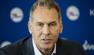 FILE - In this May 11, 2018, file photo, Philadelphia 76ers President of Basketball Operations Bryan Colangelo speaks with members of the media during a news conference at the NBA basketball team&#x27;s practice facility in Camden, N.J. The Philadelphia 76ers say Bryan Colangelo has resigned as president of basketball operations after an independent firm investigated allegations that he used a variety of Twitter accounts to anonymously trash some of his own players and fellow executives and defend himself against criticism from fans and the sports media. The team says Thursday, June 7, 2018, that Colangelo offered his resignation “recognizing the detrimental impact this matter on the organization.”(AP Photo/Matt Rourke)