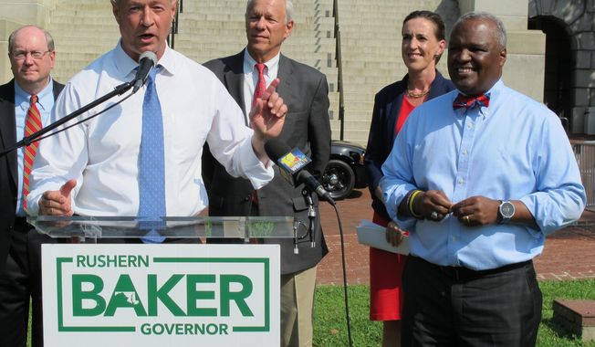 Former Gov. Martin O&#x27;Malley, front left, endorses Prince George&#x27;s County Executive Rushern Baker, right, for governor of Maryland, Thursday, June 7, 2018, in Annapolis, Md. Baker is running in a crowded Democratic primary to challenge Republican Gov. Larry Hogan in November. (AP Photo/Brian Witte)