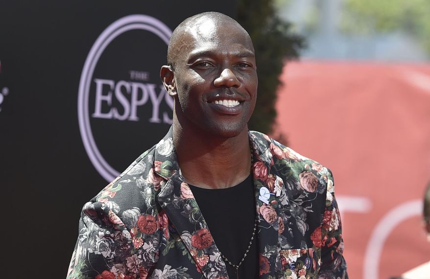 In this July 13, 2016, file photo, former NFL player Terrell Owens arrives at the ESPY Awards at the Microsoft Theater in Los Angeles. Terrell Owens says he will not attend the induction ceremony for the Pro Football Hall of Fame in August, an unprecedented decision by an enshrinee. Owens was voted into the hall in February. In a statement released Thursday, June 7, 2018, by his publicist, Owens says: “While I am incredibly appreciative of this opportunity, I have made the decision to publicly decline my invitation to attend the induction ceremony in Canton.”(Photo by Jordan Strauss/Invision/AP) **FILE**