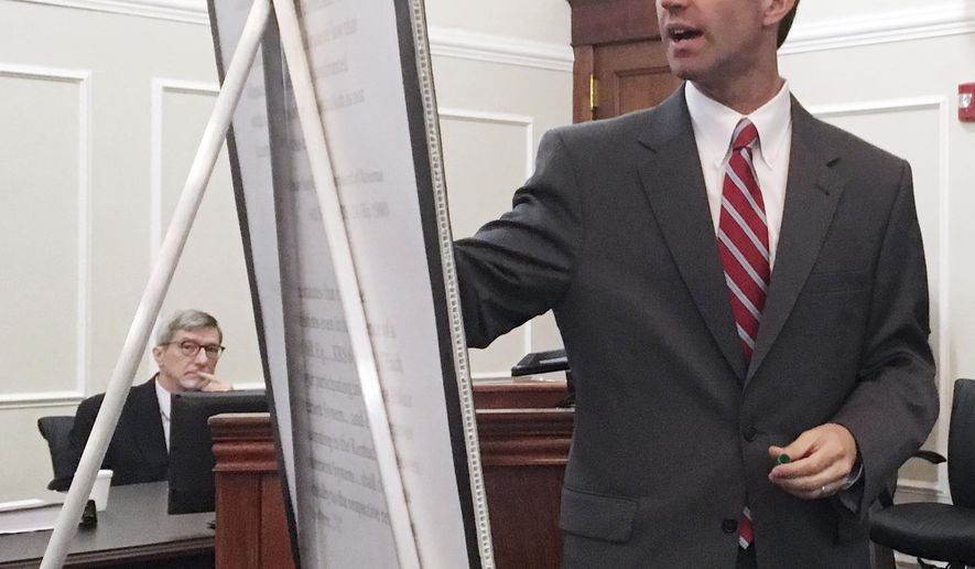 Kentucky Democratic Attorney General Andy Beshear makes an argument during a court hearing on Thursday, June 7, 2018, in Frankfort, Ky. Beshear is asking a judge to declare a recently enacted pension law unconstitutional. (AP Photo/Adam Beam)