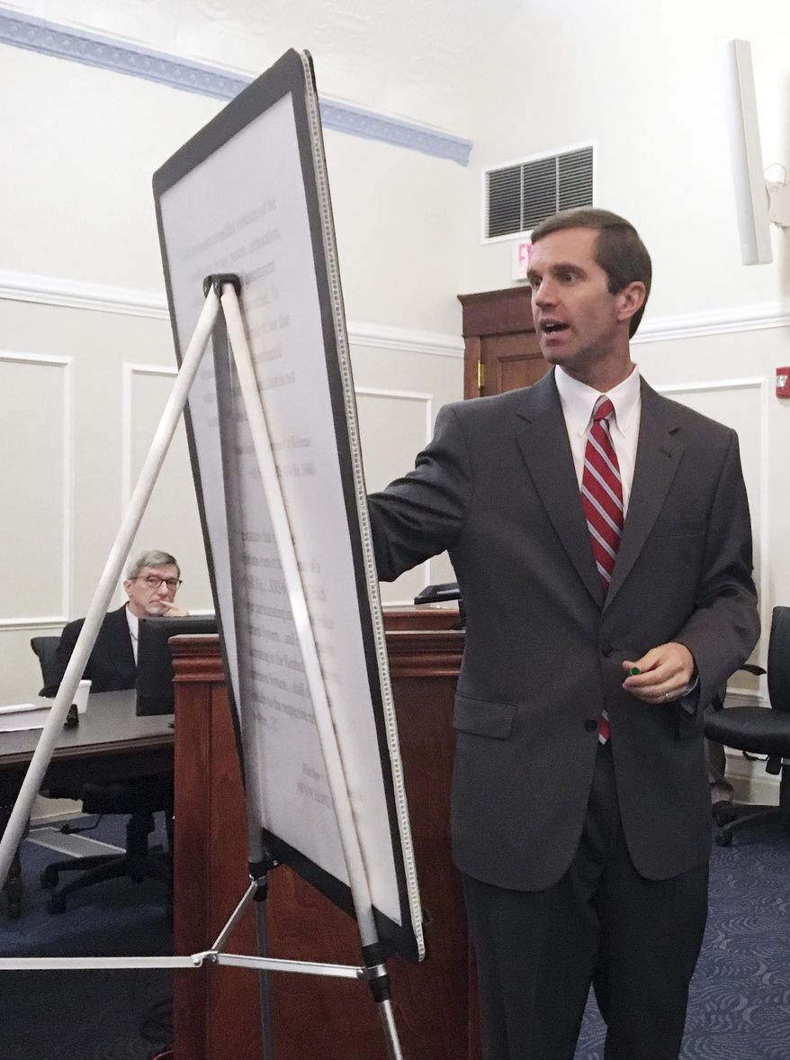 Kentucky Democratic Attorney General Andy Beshear makes an argument during a court hearing on Thursday, June 7, 2018, in Frankfort, Ky. Beshear is asking a judge to declare a recently enacted pension law unconstitutional. (AP Photo/Adam Beam)