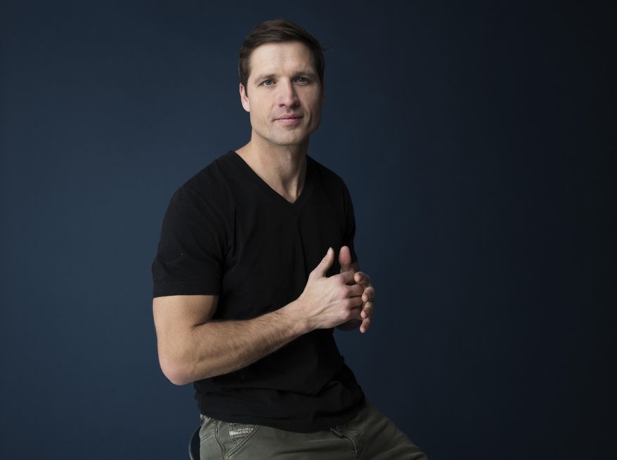 FILE - In this Dec. 11, 2017, file photo, country singer Walker Hayes poses for a portrait in New York to promote his latest album, "boom." Hayes said that his newborn daughter died after being born Wednesday, June 6, 2018. Hayes, who was nominated for breakthrough video of the year during Wednesday’s CMT Awards and was scheduled to perform at the awards show in Nashville, said in a statement that his daughter, Oakleigh Klover Hayes, ‘is safely in heaven.’ (Photo by Taylor Jewell/Invision/AP, File)
