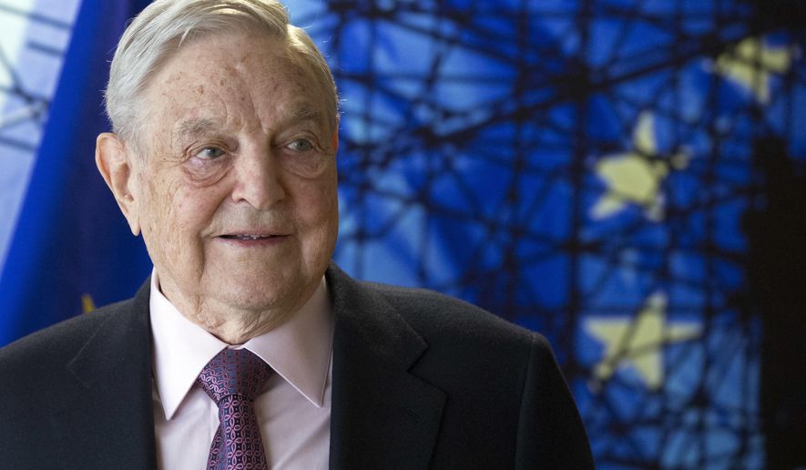 FILE - This Thursday, April 27, 2017 file photo shows George Soros, Founder and Chairman of the Open Society Foundation, before the start of a meeting at EU headquarters in Brussels. Soros contributed at least $1.5 million to support Diana Becton, who was appointed Contra Costa County&#39;s first woman and first African-American district attorney last year, and challengers seeking to oust sitting prosecutors in Alameda, Sacramento and San Diego counties. Becton may face a runoff election. (Olivier Hoslet/Pool Photo via AP, File)