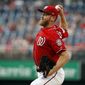 Washington Nationals starting pitcher Stephen Strasburg throws during the first inning of a baseball game against the San Francisco Giants at Nationals Park, Friday, June 8, 2018, in Washington. (AP Photo/Alex Brandon)
