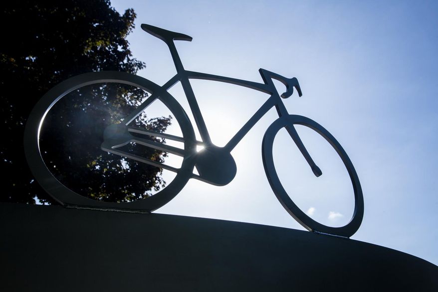 One of five bikes atop the Kalamazoo bike tragedy memorial at Markin Glen Park in Cooper Township, Mich., Thursday, June 7, 2018. Each of the five bike represents one person killed while riding their bicycles on June 7, 2016. Four others were also injured in the crash. (Joel Bissell/Kalamazoo Gazette-MLive Media Group via AP)