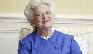 FILE - In this 1990 file photo, first lady Barbara Bush appears at the White House in Washington. Bush’s widely praised commencement address at Wellesley College is being released as a book. Scribner told The Associated Press on Thursday that “Your Own True Colors” comes out June 12, 2018. An audio edition of the 1990 speech will be published the same day. The former first lady died in April at age 92. (AP Photo/Doug Mills, File)