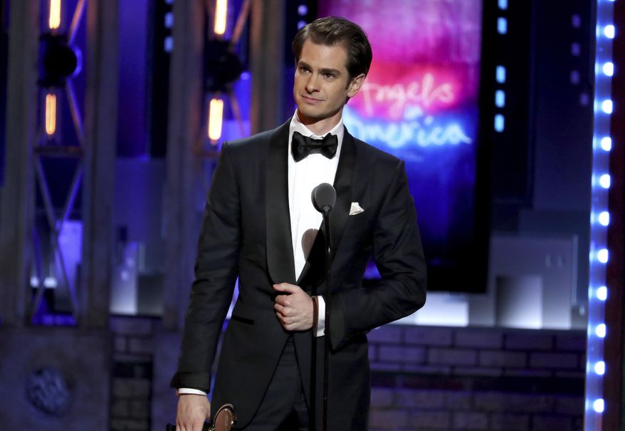 Andrew Garfield accepts the award for best leading actor in a play for "Angels in America" at the 72nd annual Tony Awards at Radio City Music Hall on Sunday, June 10, 2018, in New York. (Photo by Michael Zorn/Invision/AP)