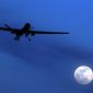 In this Jan. 31, 2010, file photo, an unmanned U.S. Predator drone flies over Kandahar Air Field, southern Afghanistan, on a moon-lit night. (AP Photo/Kirsty Wigglesworth, File)