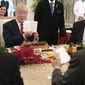 In this photo released by the Ministry of Communications and Information of Singapore, U.S. President Donald Trump gets an early birthday celebration during lunch with Singapore&#x27;s Prime Minister Lee Hsien Loong in Singapore, Monday, June 11, 2018. Trump turns 72 on Thursday. (Ministry of Communications and Information Singapore via AP)