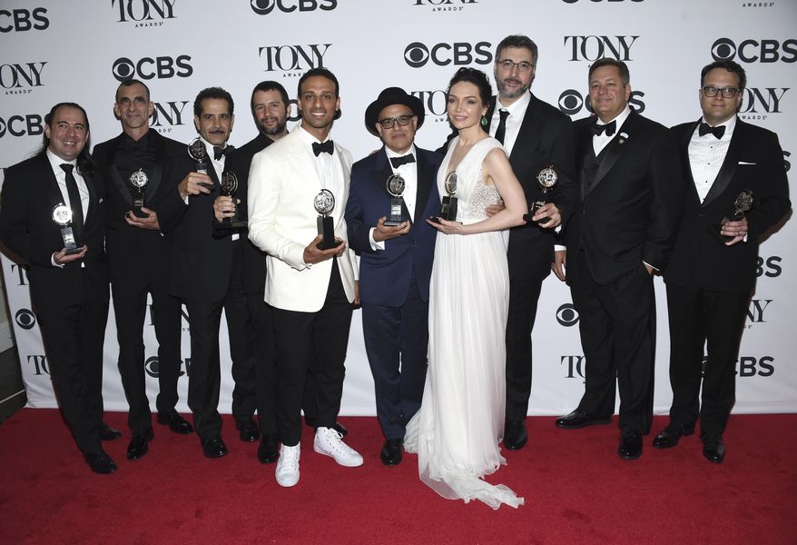 Cast and crew of "The Band's Visit" pose in the press room with the award for best musical at the 72nd annual Tony Awards at Radio City Music Hall on Sunday, June 10, 2018, in New York. (Photo by Evan Agostini/Invision/AP)