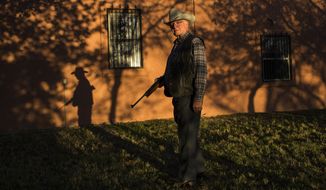 File - In this Sunday, April 2, 2017 file photo, rancher Jim Chilton poses for a photo on his ranch in Arivaca, about 80 miles southwest of Tucson, Ariz. A U.S. Border Patrol agent was wounded in a shooting on a southern Arizona ranch near the U.S.-Mexico border before dawn Tuesday, June 12, 2018, in a remote area known for drug and migrant smuggling, the agency and the cattleman who owns the property said. Chilton, a fifth-generation Arizona cattleman who runs a 50,000-acre (about 20,230-hectare) ranch outside Arivaca, told The Associated Press in an interview that the Border Patrol sent him an email saying the agent was alone when he was wounded on the ranch and was struck in the leg and the hand. (AP Photo/Rodrigo Abd, File)