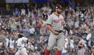 Washington Nationals pitcher Tanner Roark (57) waits as New York Yankees&#39; Didi Gregorius (18) rounds the bases with a home run during the second inning of a baseball game Tuesday, June 12, 2018, at Yankee Stadium in New York. (AP Photo/Bill Kostroun)