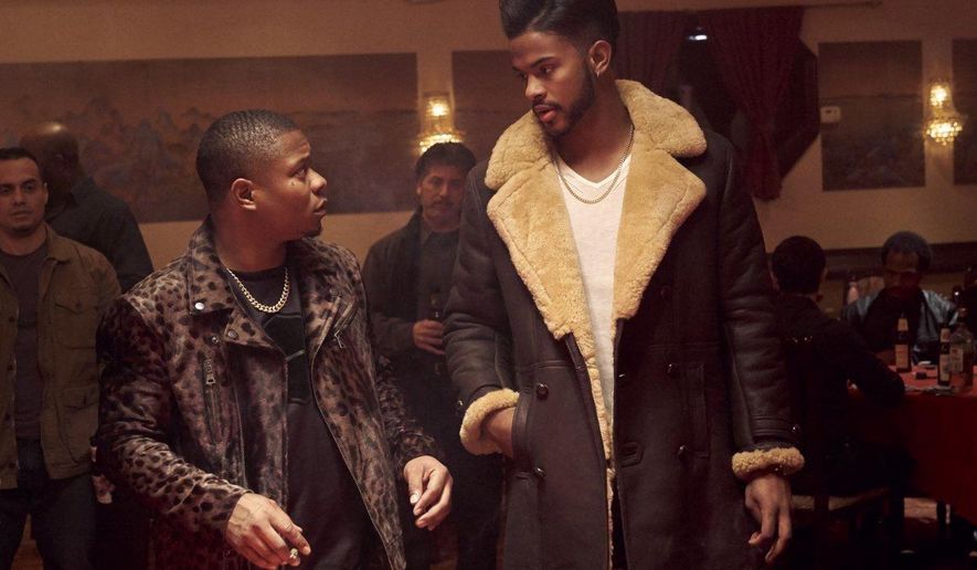 This image released by Sony Pictures shows Jason Mitchell, left, and Trevor Jackson in a scene from the film, "Superfly." (Quantrell D. Colbert/Sony Pictures via AP)