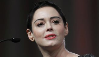 FILE- In this Oct. 27, 2017, file photo, actress Rose McGowan speaks at the inaugural Women&#39;s Convention in Detroit. A grand jury in Virginia has indicted the actress on one felony count of cocaine possession. McGowan&#39;s trial date will be set Tuesday. (AP Photo/Paul Sancya, File)