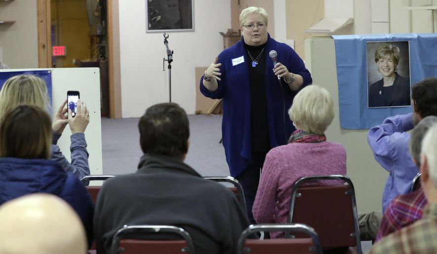FILE - In this April 14, 2018, file photo, Wisconsin assembly candidate Ann Groves Lloyd speaks at an event at the offices of Columbia County Democratic Party in Portage, Wis. Lloyd faces Republican Jon Plumer in a special election in south-central Wisconsin&#39;s 42nd Assembly District. (AP Photo/Morry Gash, File)