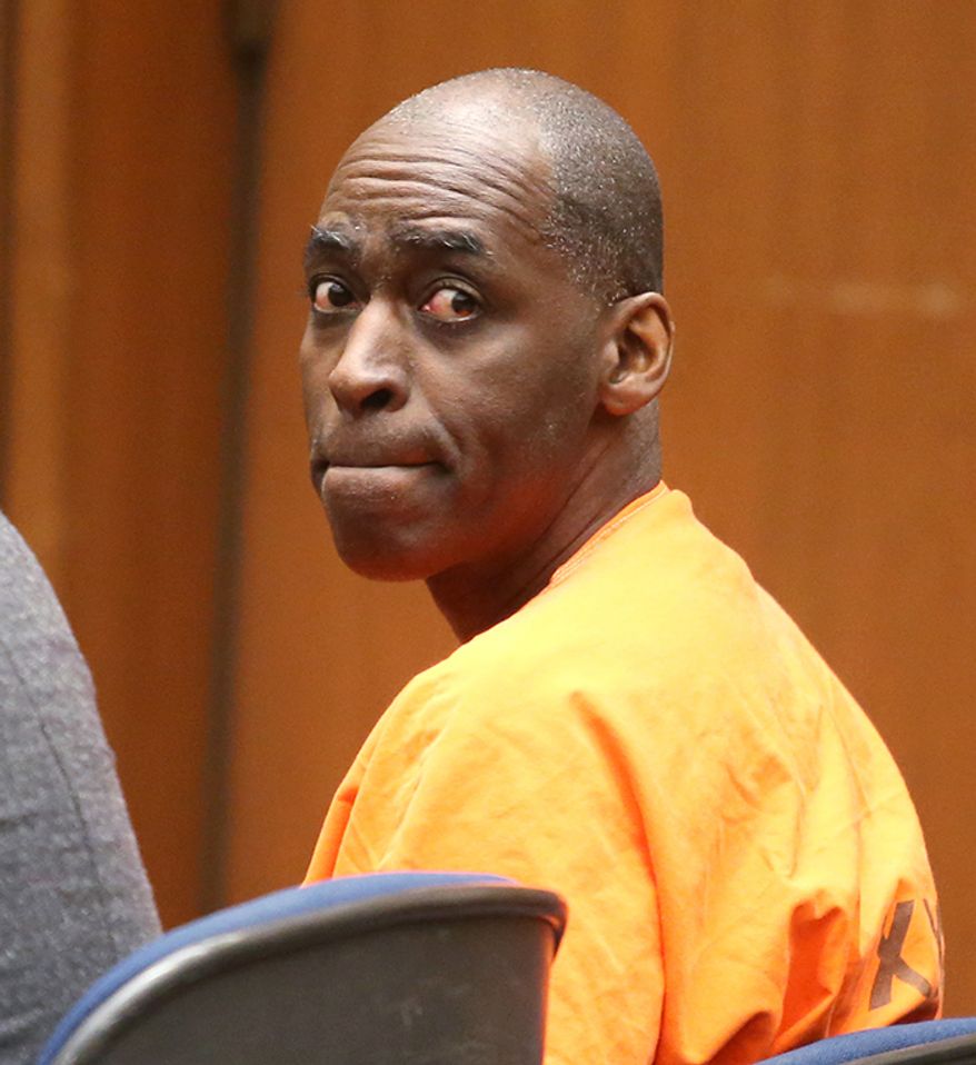 Actor Michael Jace was sentenced to 40 years to life for the shooting death of his wife, April Jace. Michael Jace, an actor who played a police officer on the TV show "The Shield," sits in Los Angeles Superior Court during his sentencing for the murder of his wife Friday, June 10, 2016. Jace was been sentenced to 40 years to life in prison for his conviction on second-degree murder charges, after an emotional hearing in which the victim's family members wept as they spoke about the impact of her loss. (Frederick M. Brown, Pool)