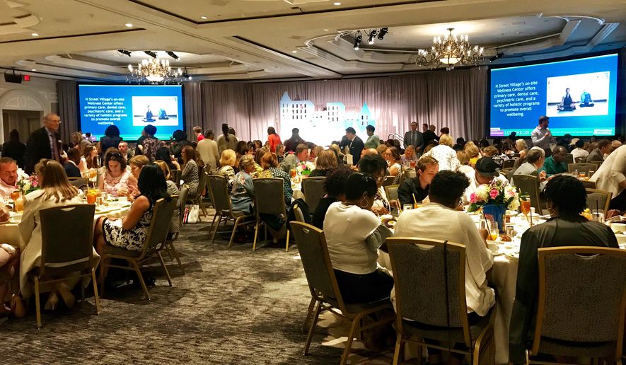 N Street Village, a nonprofit shelter and services organization for women, holds a luncheon Wednesday at the Ritz-Carlton Hotel to honor its benefactors and celebrate its successes. (Darla Dunning/The Washington Times).