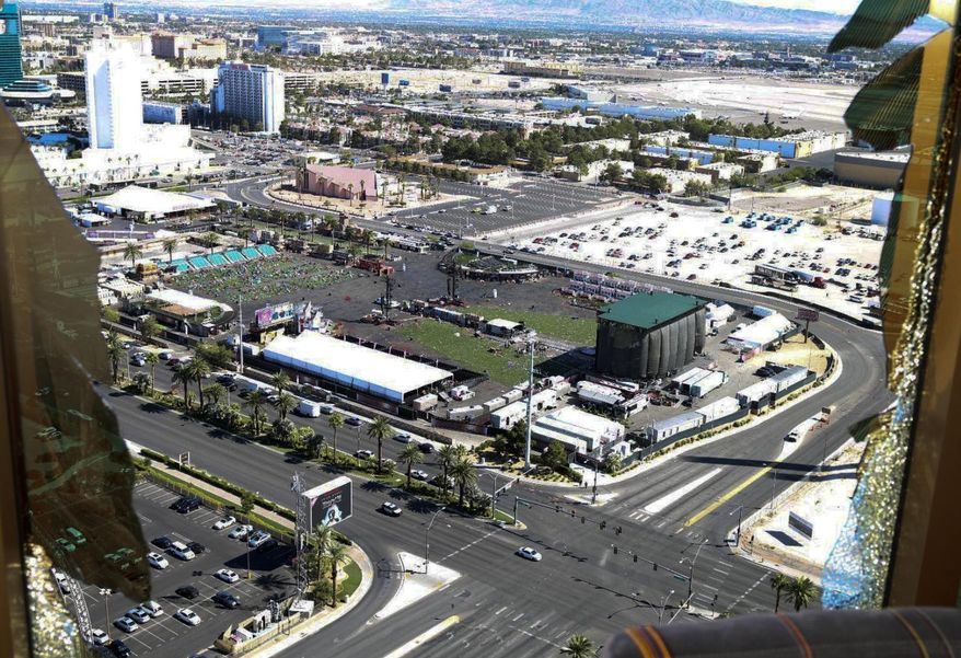 FILE - This October 2017 file photo released by the Las Vegas Metropolitan Police Department Force Investigation Team Report shows the view of Las Vegas Village from Mandalay Bay's room 32-135, part of the evidence images. Police planned to release body-worn camera video from officers who responded to the deadliest shooting in the nation's modern history last year on the Las Vegas Strip. The material released Wednesday, June 13, 2018, represents the sixth batch of Oct. 1 shooting material released since May 30 without comment by Clark County Sheriff Joe Lombardo or his department. Fifty-eight people died and hundreds were injured before authorities say the gunman, Stephen Paddock, killed himself before police reached him. (Las Vegas Metropolitan Police Department via AP, File)