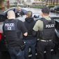 In this Feb. 7, 2017, file photo released by U.S. Immigration and Customs Enforcement, foreign nationals are arrested during a targeted enforcement operation conducted by U.S. Immigration and Customs Enforcement (ICE) aimed at immigration fugitives, re-entrants and at-large criminal aliens in Los Angeles. (Charles Reed/U.S. Immigration and Customs Enforcement via AP, File)