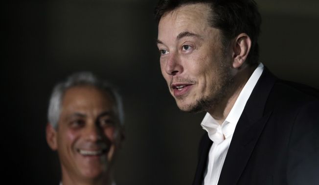 Chicago Mayor Rahm Emanuel, left, listens as Tesla CEO and founder of the Boring Company Elon Musk, right, speaks at a news conference Thursday, June 14, 2018, in Chicago. The Boring Company has been selected to build a high-speed underground transportation system that it says will whisk passengers from downtown Chicago to O&#x27;Hare International Airport in mere minutes. (AP Photo/Kiichiro Sato)