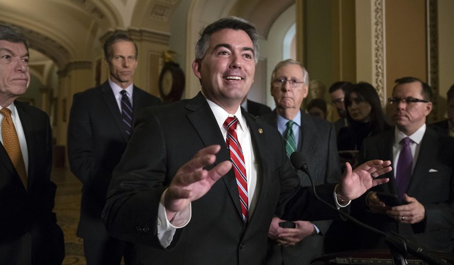 FILE - This Jan. 9, 2018 file photo shows Sen. Cory Gardner, R-Colo., after a weekly, closed-door strategy session at the Capitol in Washington. The legal marijuana industry often finds the doors locked at banks, its money unwanted because the drug remains illegal under federal law. But President Donald Trump might help change that, at least partly. The Republican president last week said he was inclined to support a bipartisan proposal in Congress, which Gardner introduced, to ease the U.S. ban on marijuana, which if enacted could encourage more banks to accept money from cannabis companies. (AP Photo/J. Scott Applewhite, File)