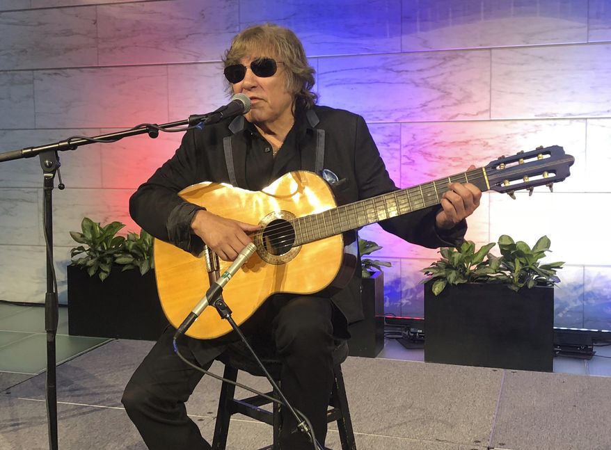 Grammy Award-winning artist Jose Feliciano performs the “Star-Spangled Banner” at the Smithsonian’ National Museum of American History in Washington, Thursday June 14, 2018. Feliciano also donated objects reflecting his international career to the museum. (AP Photo/Luis Alonso Lugo)
