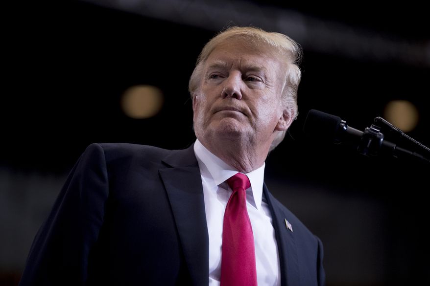 FILE - In this May 29, 2018 file photo, President Donald Trump pauses while speaking at a rally at the Nashville Municipal Auditorium, in Nashville, Tenn. Trump's personal attorney wants a federal judge to stop the lawyer for porn actress Stormy Daniels from speaking to reporters. An attorney for Michael Cohen filed court papers Thursday night, June 14, 2018, alleging Daniels' lawyer Michael Avenatti is tainting the case. (AP Photo/Andrew Harnik, File)
