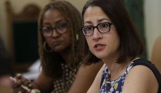 Assemblywoman Laura Friedman, D-Glendale, right, discusses the creation of a new investigative unit to focus on harassment complaints, while talking with reporters Friday, June 15, 2018, in Sacramento, Calif. Friedman and state Sen. Holly Mitchell, D-Los Angeles, left, co-chairs of a legislative subcommittee looking into sexual harassment at the Capitol, outlined a draft proposal on how to improve the legislature&#39;s sexual misconduct policies after several lawmakers were accused of groping and other inappropriate acts. (AP Photo/Rich Pedroncelli)