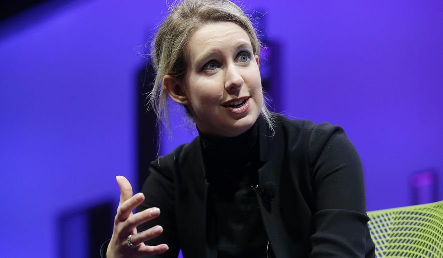 FILE - In this Nov. 2, 2015, file photo, Elizabeth Holmes, founder and CEO of Theranos, speaks at the Fortune Global Forum in San Francisco. Federal prosecutors said Friday, June 15, 2018, they have indicted Holmes on criminal fraud charges for allegedly defrauding investors, doctors and patients as the head of the once-heralded blood-testing startup Theranos. (AP Photo/Jeff Chiu, File)