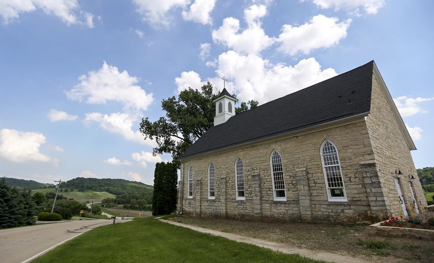 This Friday, June 1, 2018 photo shows the former Lattnerville Church in Graf, Iowa, which has been converted into an inn. (Nicki Kohl/Telegraph Herald via AP)