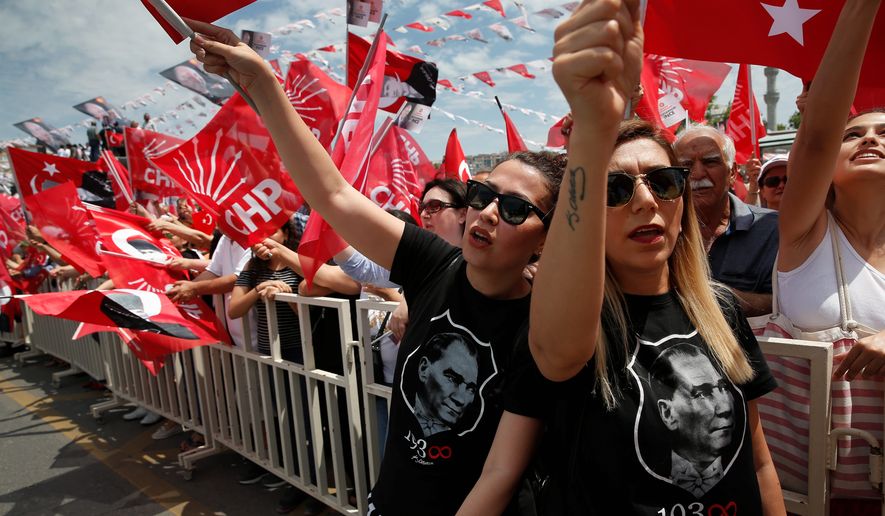 Wearing T-shirts with pictures of Turkish Republic founder Mustafa Kemal Ataturk, supporters rally for Muharrem Ince, who is seen as a strong contender to end President Recep Tayyip Erdogan&#x27;s 16-year rule in presidential elections next week. (Associated Press)