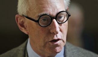 Roger Stone talks to people outside a courtroom in New York, Thursday, March 30, 2017. (AP Photo/Seth Wenig) ** FILE **