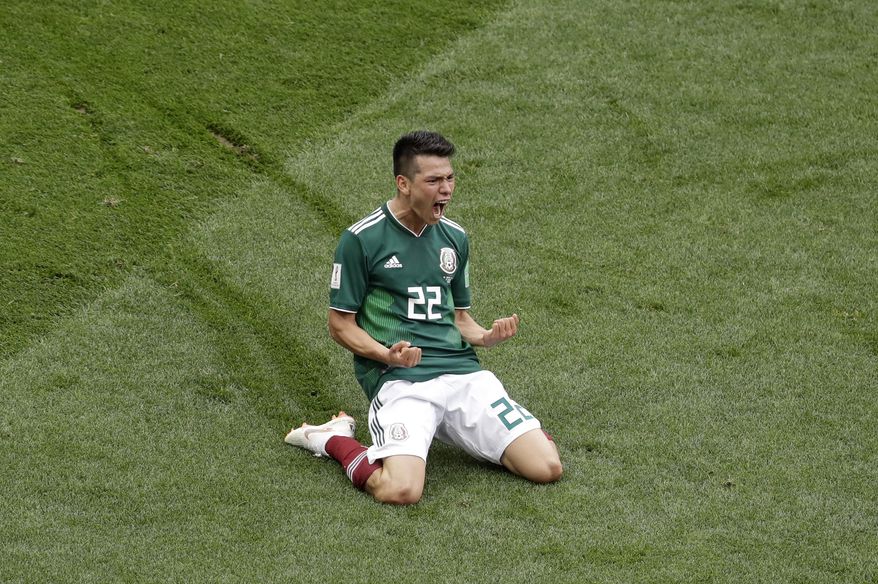 Mexico's Hirving Lozano celebrates after scoring the opening goal during the group F match between Germany and Mexico at the 2018 soccer World Cup in the Luzhniki Stadium in Moscow, Russia, Sunday, June 17, 2018. (AP Photo/Michael Probst)