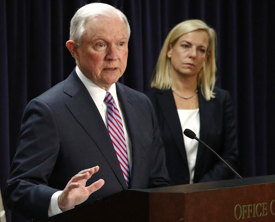 FILE - In this Tuesday, Dec. 12, 2017, file photo, U.S. Attorney General Jeff Sessions, left, speaks alongside Secretary of Homeland Security Kirstjen Nielsen during a news conference in Baltimore. Sessions and Nielsen are among the speakers slated to address a gathering of the nation’s sheriffs in New Orleans. The opening session of the National Sheriff’s Association annual conference begins Monday, June 18, 2018. (AP Photo/Patrick Semansky, File)