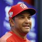 Washington Nationals manager Dave Martinez smiles during a media availability before the home opener baseball game against the New York Mets at Nationals Park, Thursday, April 5, 2018, in Washington. (AP Photo/Alex Brandon)
