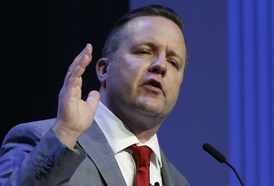 Republican primary senatorial candidate Corey Stewart gestures during a debate with E. W. Jackson and Del. Nick Freitas at Liberty University in Lynchburg, Va., Thursday, April 19, 2018. (AP Photo/Steve Helber)
