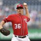 Washington Nationals relief pitcher Sammy Solis delivers a pitch during the sixth inning of the continuation of a suspended baseball game, Monday, June 18, 2018, in Washington. (AP Photo/Nick Wass) **FILE**
