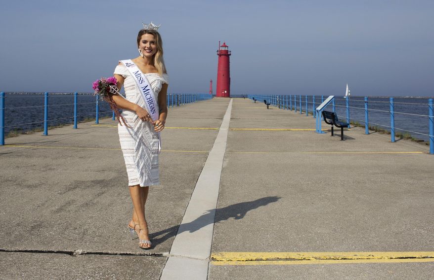 In this Sunday, June 17, 2018, photo, Miss Michigan 2018 Emily Sioma poses for a portrait in Muskegon, Michigan. The newly-crowned Miss Michigan plans to use her platform to support survivors of sexual assault. (Mike Krebs/Muskegon Chronicle via AP)