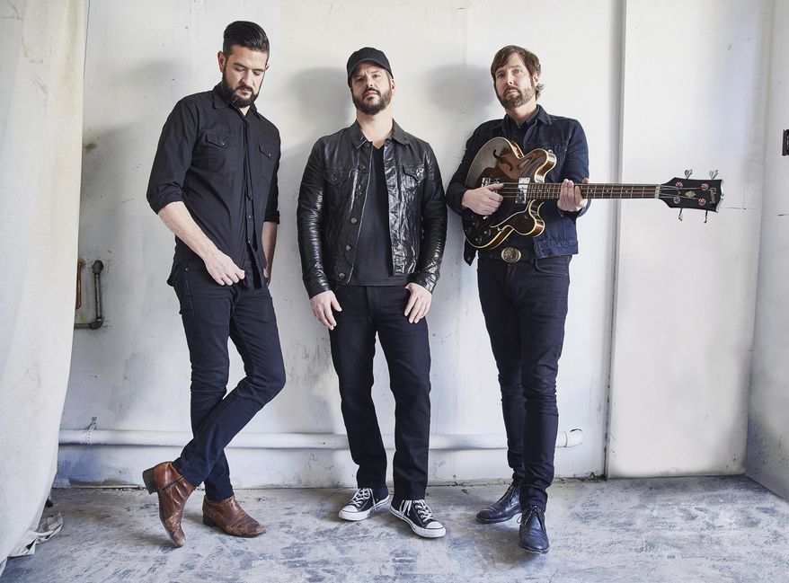 This image released by Concord Records shows, from left, Marc Cazorla, Chris Vos and Alex Stiff of The Record Company. The band's latest album, "All Of This Life," releases on June 22. (Jen Rosenstein/Concord Records via AP)