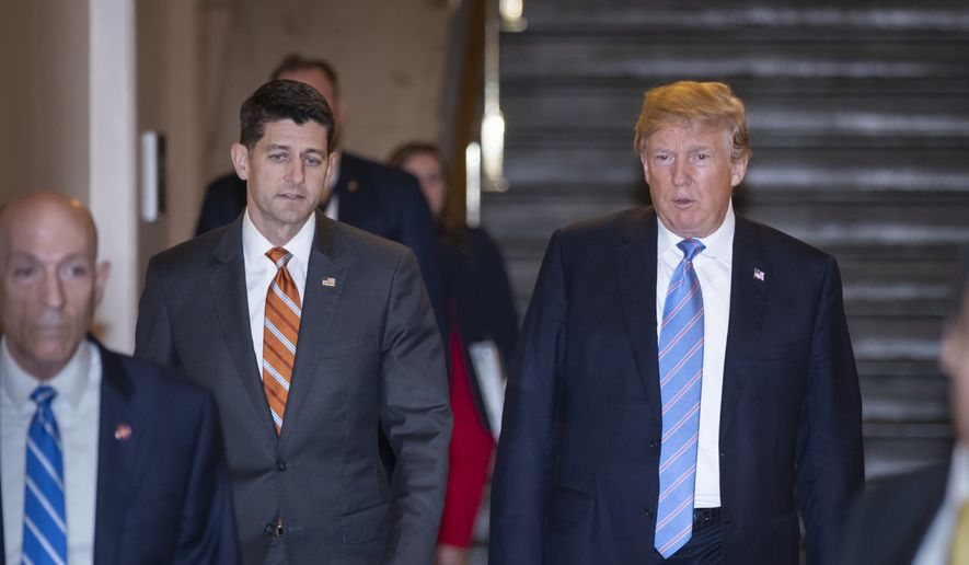Speaker of the House Paul Ryan, R-Wis., left, walks with President Donald Trump as they head to a meeting of House Republicans to discuss a GOP immigration bill at the Capitol in Washington, Tuesday, June 19, 2018. (AP Photo/J. Scott Applewhite)