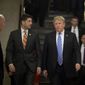 President Donald Trump, accompanied by House Speaker Paul Ryan of Wis., arrives on Capitol Hill in Washington, Tuesday, June 19, 2018, to rally Republicans around a GOP immigration bill.  (AP Photo/Andrew Harnik) ** FILE **