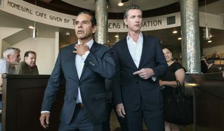 California&#39;s Lt. Gov. Gavin Newsom, right, is joined by former Los Angeles Mayor Antonio Villaraigosa at a news conference at Homeboy Industries on Tuesday, June 19, 2018, in downtown Los Angeles. As rival Democratic candidates for governor, Newsom and Villaraigosa spent months talking about their differences. With the race behind them, they can&#39;t stop trading compliments as Newsom begins a fall campaign against Republican John Cox. (AP Photo/Richard Vogel)