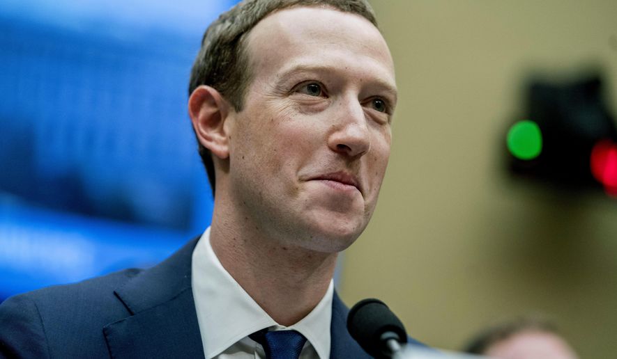 FILE - In this April 11, 2018 file photo, Facebook CEO Mark Zuckerberg pauses while testifying on Capitol Hill in Washington. Some business leaders including Zuckerberg are condemning the Trump administration's decision to separate children from parents who are accused of crossing the border illegally, but it's unclear what impact - if any - they will have. (AP Photo/Andrew Harnik, File)